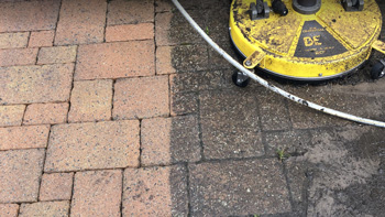 Photo of the before and after of pressure washing a driveway in Edinburgh